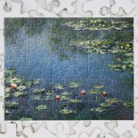 Puzzle Waterlilies por Claude Monet, Flores de época<br><div class="desc">Water Lilies (1906) de Claude Monet es una pintura floral vintage de estilo impresionista de arte fino paisaje de flores. Es una de las muchas variaciones de pinturas de nenúfares que Monet pintó en su jardín de flores en Giverny, Francia. Flores de lirio en un estanque de primavera. Sobre el...</div>