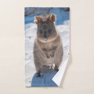 Quokka feliz en la playa