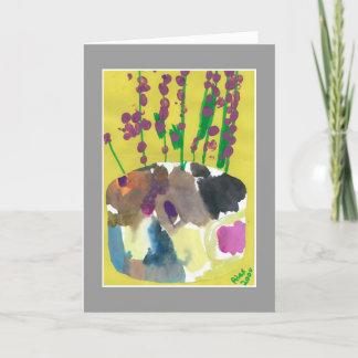 Ramilletes púrpuras con la tarjeta de la cita de