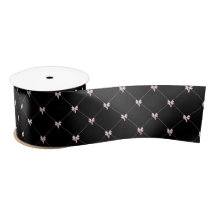 Envoltura de regalo con lazo negro y rosa