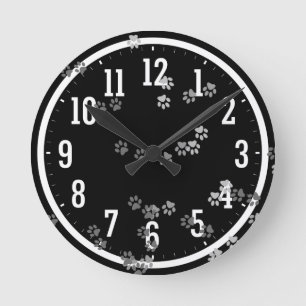 Rastros divertidos de reloj de pared de los pies