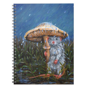 Rata en lluvia debajo del cuaderno de la seta