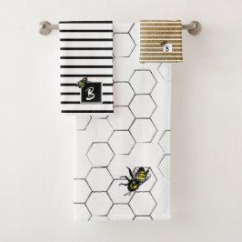 Raya de la abeja reina con el monograma del peine