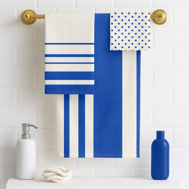 Rayas Azules Marinas de Marfil Lunares (A classic bathroom towel set in ivory and marine blue with stripes and polka dots)
