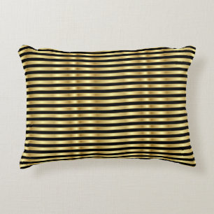 Rayas doradas sobre almohada de acento negro