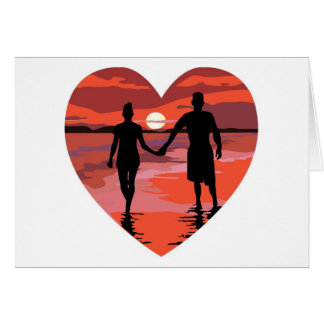 Red Heart Sunset Beach con las manos