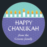 Redonda Chanukah Menorah Pegatina<br><div class="desc">Enciende la menorah y comparte tu alegría en Chanukah. Un mensaje de vacaciones coronado por una menorah Chanukah completamente iluminada imprime contra paneles de color morado y verde azulado con un sutil patrón de círculo. Disponible en colores alternativos con franqueo,  tarjetas fotográficas,  tarjetas y etiquetas coincidentes.</div>