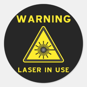 Redonda Pegatina del símbolo amonestador de laser