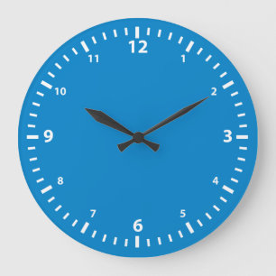 Redondo Grande Cara de reloj con números blancos sobre azul turqu