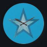 Redondo Grande Reloj de estrella azul azul<br><div class="desc">Diseño moderno con una estrella "brillante" azul y blanco sobre un fondo azul. Reloj de pared con un diseño de personalizable para que puedas personalizar con tu propio texto, imágenes e ideas. Tenga en cuenta que se trata de una imagen impresa creada con fotografías originales y técnicas digitales, que no...</div>