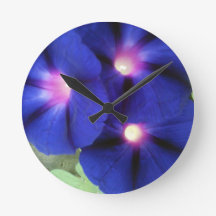 Reloj morado de pared floral