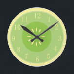 Redondo Mediano Reloj verde en colores pastel de la cocina de Guay<br><div class="desc">¿El reloj verde en colores pastel de la cocina de Guay del arte del melón de ligamaza, completo con las semillas está para cualquier persona que ame esta invitación dulce deliciosa, así que la recepción en una mañana del verano? ¡Regalo aseado para la mamá en Día de la Madre, navidad...</div>