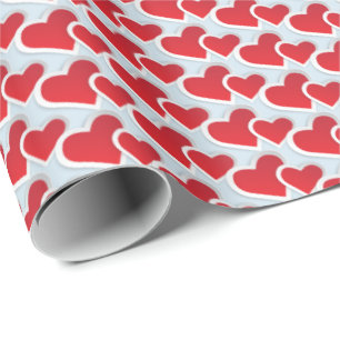 Regalo 2 corazones de papel rojo en un patrón repetido