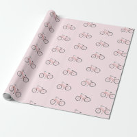 Bicicletas dulces de color rosa sobre papel de env