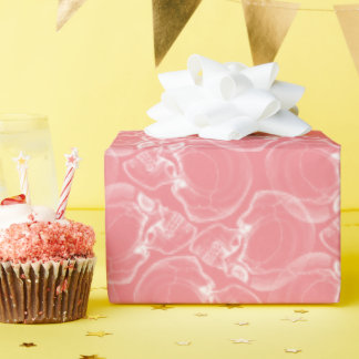 Regalo Calavera sobre papel de envolver rosado