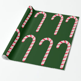 Regalo Cañones de caramelo sobre papel verde oscuro