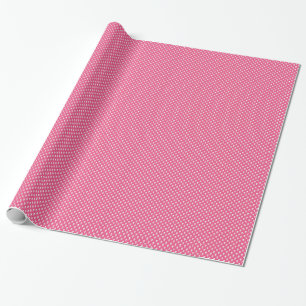 Regalo Cráneos blancos en el papel de embalaje rosado