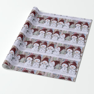 Regalo Cuatro hombres de nieve envolviendo papel