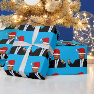 REGALO DONALD TRUMP USANDO PAPEL DE SANTA WRAPPING