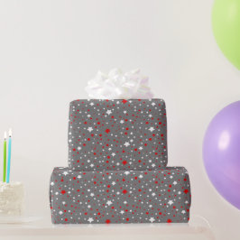 Regalo Estrellas rojas y blancas sobre papel de envolver