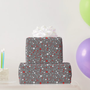 Regalo Estrellas rojas y blancas sobre papel de envolver
