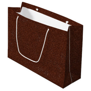 Regalo Grande Una bolsa de papel marrón con un asa blanca