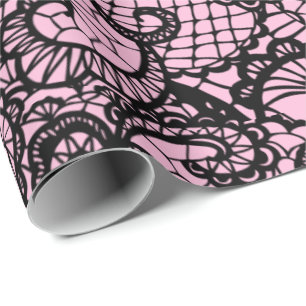 Regalo Lazo negro sobre papel de envolver rosado