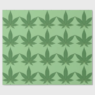 Regalo Leña de hoja verde sobre papel de envolvimiento ve