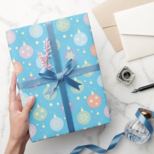 Regalo Navidades envolviendo papel con nieve en bolas de