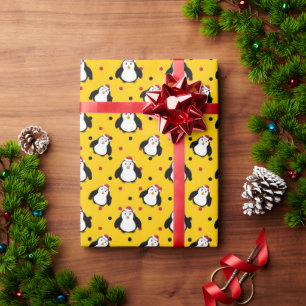 Regalo Pingüinos con papel de envolver en ambiente navide