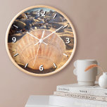 Reloj Audaz concha de mar en una foto de una playa de ar<br><div class="desc">La luz de última hora de la tarde hace que esta concha en una playa del sur de California parezca luminosa. Relájese y viaje de vuelta a sus días de playa de vacaciones cada vez que mire la hora en este impresionante y hermoso reloj de pared fotográfico. Tu elección de...</div>