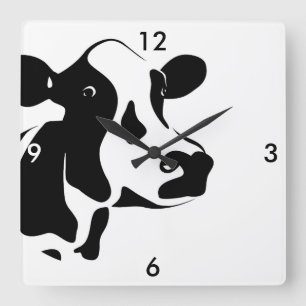 Reloj blanco y negro cuadrado de la vaca