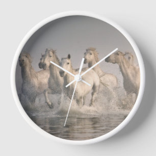 Reloj Caballo galopando en el agua mediterránea