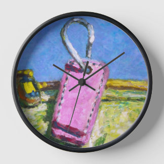 Reloj con etiqueta rosa