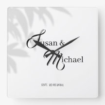 Reloj con tema negro y blanco de novia y novio
