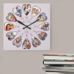 Reloj Cuadrado 12 fotos en forma de corazón rosadas<br><div class="desc">Crea tu propio reloj multifotográfico para contar tu historia - el centro del reloj está marcado con "Érase una vez" en tipografía escrita a mano. Utilice la plantilla de fotos para añadir 12 de sus fotos favoritas, que se mostrarán en marcos con forma de corazón. El diseño utiliza fotos verticales...</div>