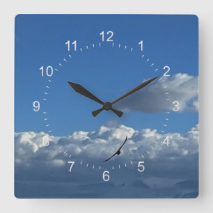 Reloj Cuadrado A flight under the clouds
