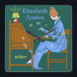 Reloj Cuadrado Art Deco Lady Author at Writing Desk in Blue<br><div class="desc">This personalized square wall clock has a vintage Art Deco stencil look. A woman in a blue dress sits at a writing desk with pen raised while a lamp shines next to her. The background is dark teal. The woman looks like she is from the 19th or early 20th century....</div>