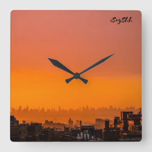 Reloj Cuadrado Atardecer sobre la ciudad