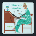 Reloj Cuadrado Autora de Art Deco en escritorio en Verde azulado<br><div class="desc">Este reloj de pared cuadrado personalizado tiene un estilo Art Decó vintage. Una mujer negra vestida con un vestido verde azulado se sienta en un escritorio con un bolígrafo levantado mientras una lámpara brilla a su lado. El fondo es azul verdoso y claro. La mujer parece ser de los siglos...</div>