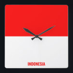 Reloj Cuadrado Bandera de Indonesia deslumbrante patriótico<br><div class="desc">Bandera de Indonesia Deslumbrando el Reloj de Muro Patriótico en los colores y los elementos de la bandera nacional de Indonesia cubriendo la parte delantera del reloj. Los colores de la bandera nacional se complementan con el texto "Indonesia" en la parte inferior. El texto es totalmente personalizable usando la función...</div>