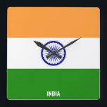Reloj Cuadrado Bandera de la India deslumbrando la Plaza Patrióti<br><div class="desc">Bandera de la India Deslumbrando el reloj de pared Patriótico Square en los colores y los elementos de la bandera nacional de la India cubriendo la parte delantera del reloj. Los colores de la bandera nacional se complementan con el texto "India" en la parte inferior. El texto es totalmente personalizable...</div>