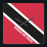 Reloj Cuadrado Bandera de Trinidad y Tobago deslumbrante patrióti<br><div class="desc">Bandera de Trinidad y Tobago deslumbrando el reloj de pared de la Plaza Patriótica con los colores y los elementos de la bandera nacional de Trinidad y Tobago cubriendo la parte delantera del reloj. Los colores de la bandera nacional se complementan con el texto "Trinidad y Tobago" en la parte...</div>