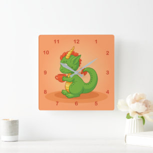 Reloj Cuadrado Bebé dragón lindo sosteniendo taza sobre naranja