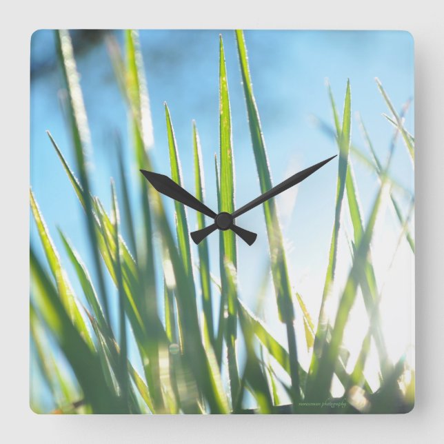 Reloj Cuadrado Blades iluminados por el sol (Anverso)