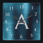 Reloj Cuadrado Blue Modern Elegant Metallic Monograma Nombre<br><div class="desc">Moderno y elegante Relieve metalizado de acero inoxidable Blue Faux Monograma y reloj de pared Personalizado personalizado inicial. El Wall Clock es un regalo perfecto para los amantes de la decoración moderna de moda metálica como Navidades o como regalo de cumpleaños.</div>