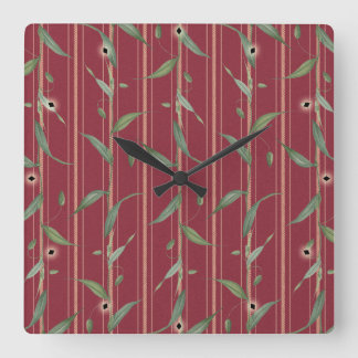 Reloj Cuadrado Branch of leaves on red wallpaper
