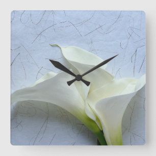 Reloj Cuadrado Calla se liga en el fondo decorativo
