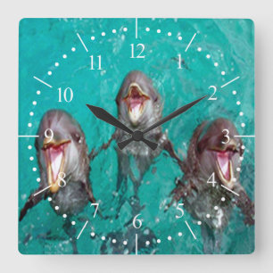 Reloj Cuadrado Cantando delfines en el océano