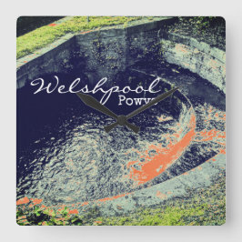 Reloj Cuadrado Cascada y piscina naranja en Welshpool, Powys